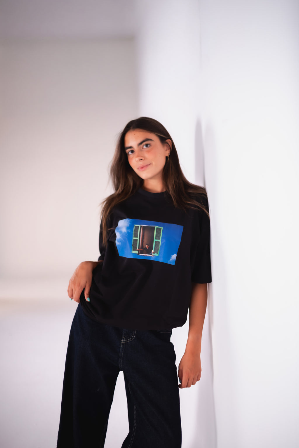 Open Sky Tee front view - female model side